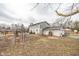 Side yard with gardening space and detached garage at 8139 Hi Vu Dr, Indianapolis, IN 46227
