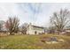 Spacious backyard with patio and fire pit area at 8139 Hi Vu Dr, Indianapolis, IN 46227