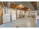 Unfinished basement with laundry hookups and ample storage space at 8139 Hi Vu Dr, Indianapolis, IN 46227