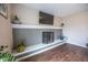 Gray brick fireplace with a modern black metal screen at 8139 Hi Vu Dr, Indianapolis, IN 46227