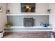 Gray brick fireplace with a modern black metal screen at 8139 Hi Vu Dr, Indianapolis, IN 46227