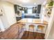 Modern kitchen with island and breakfast bar at 8139 Hi Vu Dr, Indianapolis, IN 46227