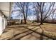 A spacious backyard with mature trees providing shade and privacy at 8815 Frontenac Rd, Indianapolis, IN 46226