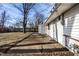 A backyard featuring a patio area and access to a storage shed at 8815 Frontenac Rd, Indianapolis, IN 46226