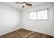 A bedroom with a ceiling fan and natural light from the window at 8815 Frontenac Rd, Indianapolis, IN 46226