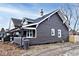 Gray sided home with a covered porch at 1058 N Holmes Ave, Indianapolis, IN 46222