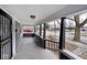 Covered porch with dark columns and street view at 1058 N Holmes Ave, Indianapolis, IN 46222