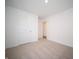 Neutral bedroom featuring carpet, a closet, and an open doorway at 1132 Fleming Dr, Greenfield, IN 46140
