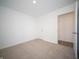 Neutral bedroom featuring carpet, a closet, and an open doorway at 1132 Fleming Dr, Greenfield, IN 46140