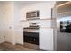 Well-equipped kitchen featuring stainless steel appliances, quartz countertops, and modern cabinetry at 1132 Fleming Dr, Greenfield, IN 46140