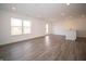 Spacious living room with recessed lights and wood-look flooring at 1132 Fleming Dr, Greenfield, IN 46140