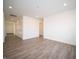 An open living area boasting recessed lights, wood-look floors, and a welcoming atmosphere at 1132 Fleming Dr, Greenfield, IN 46140