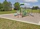 Community playground includes slides, swings and climbing structure for children at 1132 Fleming Dr, Greenfield, IN 46140