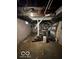 Unfinished basement with exposed utilities and concrete floor at 1154 N Belleview Pl, Indianapolis, IN 46222
