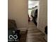 Walk-in closet with ample hanging and shelving space at 1154 N Belleview Pl, Indianapolis, IN 46222