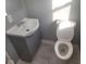 Bathroom with gray vanity and white fixtures at 1510 Josephine St, Martinsville, IN 46151