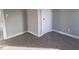 A cozy bedroom featuring neutral walls and plush carpeting at 1510 Josephine St, Martinsville, IN 46151