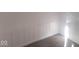 Close up of a closet with wainscoting trim and newer carpet at 1510 Josephine St, Martinsville, IN 46151