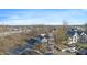 Wide aerial view of a residential area near a playground and highway, showcasing a neighborhood with green spaces and convenient access at 1515 Ringgold Ave, Indianapolis, IN 46203