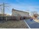 Home exterior near a playground, set against a blue sky, offering outdoor enjoyment and community engagement at 1515 Ringgold Ave, Indianapolis, IN 46203