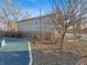 House exterior with a view of backyard, showcasing mature trees and proximity to a playground, perfect for Gathering enjoyment at 1515 Ringgold Ave, Indianapolis, IN 46203