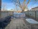 Cozy backyard featuring a fenced above-ground pool with a small patio and a grill, ideal for outdoor relaxation and entertainment at 1515 Ringgold Ave, Indianapolis, IN 46203