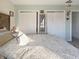 This bedroom offers dual closets and a large bed for relaxing and unwinding at 1515 Ringgold Ave, Indianapolis, IN 46203