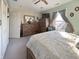 This charming bedroom features wood dresser, ceiling fan, and natural light from the window at 1515 Ringgold Ave, Indianapolis, IN 46203