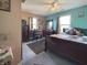 This bedroom features a queen size bed, ample natural light, and neutral paint at 1515 Ringgold Ave, Indianapolis, IN 46203