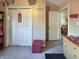 Bedroom showcasing a closet, doorway, accent pieces and neutral decor at 1515 Ringgold Ave, Indianapolis, IN 46203