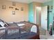 This bedroom features a queen size bed, access to a closet, and neutral paint at 1515 Ringgold Ave, Indianapolis, IN 46203