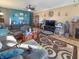 Inviting living room featuring hardwood floors, a ceiling fan, neutral paint, and ample space for relaxing and entertaining at 1515 Ringgold Ave, Indianapolis, IN 46203