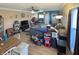 Spacious living room featuring hardwood floors, a cozy dining area and neutral paint, perfect for Gathering living at 1515 Ringgold Ave, Indianapolis, IN 46203