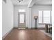 Bright entryway features hardwood floors, neutral walls, and ample natural light from the windows at 16012 Forewood Ln, Fishers, IN 46037