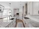 Modern kitchen with sleek countertops, stainless steel appliances, and ample cabinet space for storage and functionality at 16012 Forewood Ln, Fishers, IN 46037