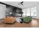Contemporary living room featuring modern decor, large windows, and ample natural light at 16012 Forewood Ln, Fishers, IN 46037