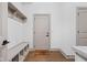 Functional mudroom with built-in bench, storage cubbies, and neutral color palette at 16012 Forewood Ln, Fishers, IN 46037