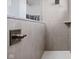 Modern shower featuring subway tile, bronze hardware and fixtures, and a rainfall shower head at 16012 Forewood Ln, Fishers, IN 46037