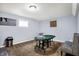 Basement with a poker table, window and wall decor, perfect for entertaining at 16457 Anderson Way, Noblesville, IN 46062
