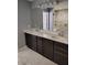 Bathroom featuring a double sink vanity, modern fixtures, and large mirror at 16457 Anderson Way, Noblesville, IN 46062
