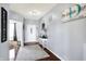Inviting foyer featuring hardwood floors, a console table, and stylish decor at 16457 Anderson Way, Noblesville, IN 46062