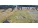 An aerial view shows a sprawling lawn and green space ready for animals or crops at 22351 Cyntheanne Rd, Noblesville, IN 46060