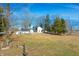 Charming two-story home with a three-car garage surrounded by trees and a spacious yard at 22351 Cyntheanne Rd, Noblesville, IN 46060