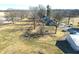 Aerial shot of a home with an outbuilding, a picnic table and a green lawn at 22351 Cyntheanne Rd, Noblesville, IN 46060