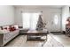 Inviting living room space with lots of light and stylish furniture, ideal for relaxing at 3144 Voigt Dr, Indianapolis, IN 46224