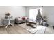 Cozy living room featuring elegant decor, soft lighting and a chic area rug at 3144 Voigt Dr, Indianapolis, IN 46224