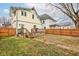 House backyard with deck and wooden fence at 317 N Arsenal Ave, Indianapolis, IN 46201