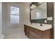 Modern bathroom with double vanity and stylish finishes at 317 N Arsenal Ave, Indianapolis, IN 46201