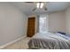 Charming bedroom with a window and hardwood floors at 317 N Arsenal Ave, Indianapolis, IN 46201