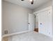 Spacious bedroom with double doors and access to hallway at 317 N Arsenal Ave, Indianapolis, IN 46201